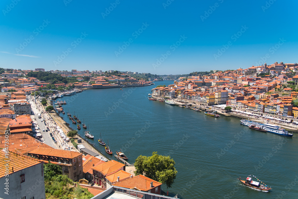 Porto, Portugal, panorama of the river Douro and tiles roofs
