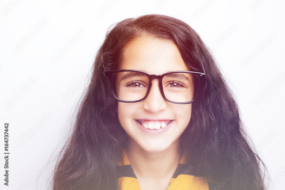 Obraz premium Image of a beautiful African young girl wearing glasses.