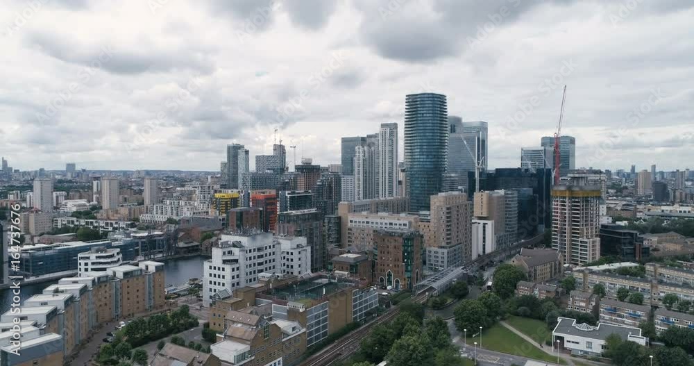 Aerial dolly view of the financial district of the Docklands in London Aerial dolly view of the financial district of the Docklands in London
