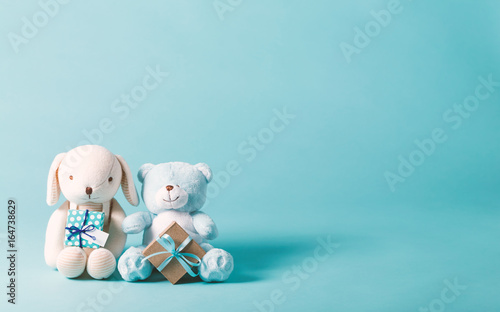 Obraz na plátně Child celebration theme with present boxes and stuffed animals