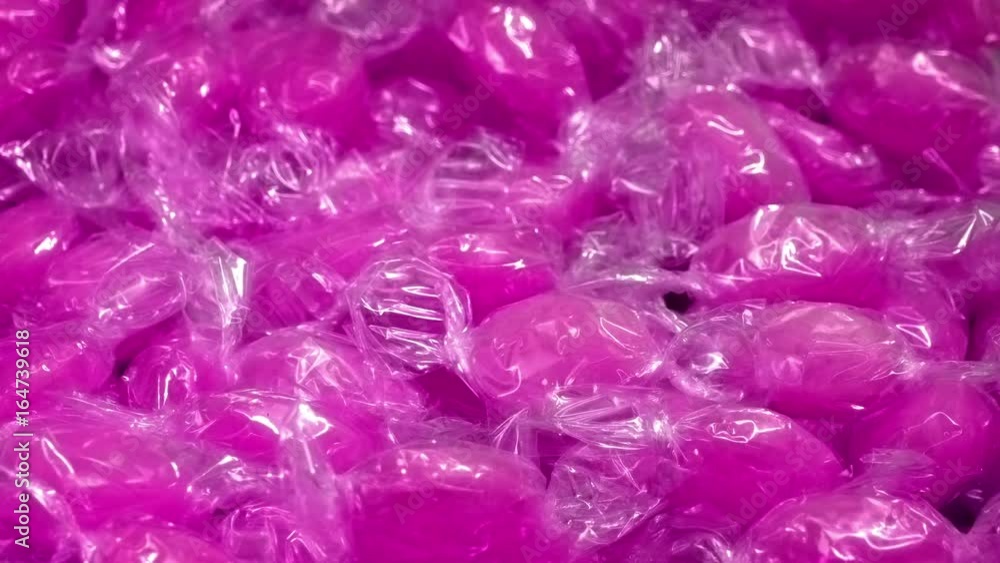 Pink Candies In Wrappers Rotating Pink Candies In Wrappers Rotating