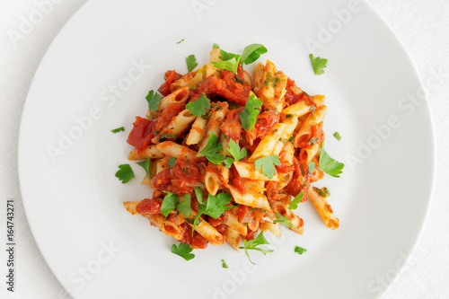 pasta with olive oil, tomato, onion, garlic, oregano, and parsley 