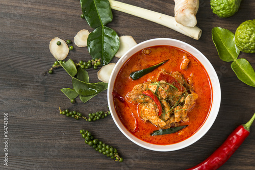 Bilde på lerret Thai Food Curry pock Spicy on wood table,Cooking Concept