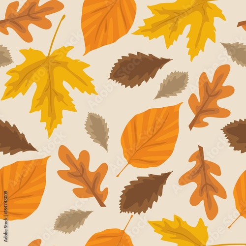 Autumn season yellow and orange leaves background seamless pattern