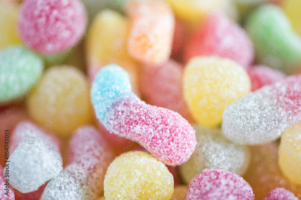 Close-Up Of Colorful Candy. Composition with tasty jelly candies. fruit jelly with sugar-coated Close-Up Of Colorful Candy. Composition with tasty jelly candies. fruit jelly with sugar-coated