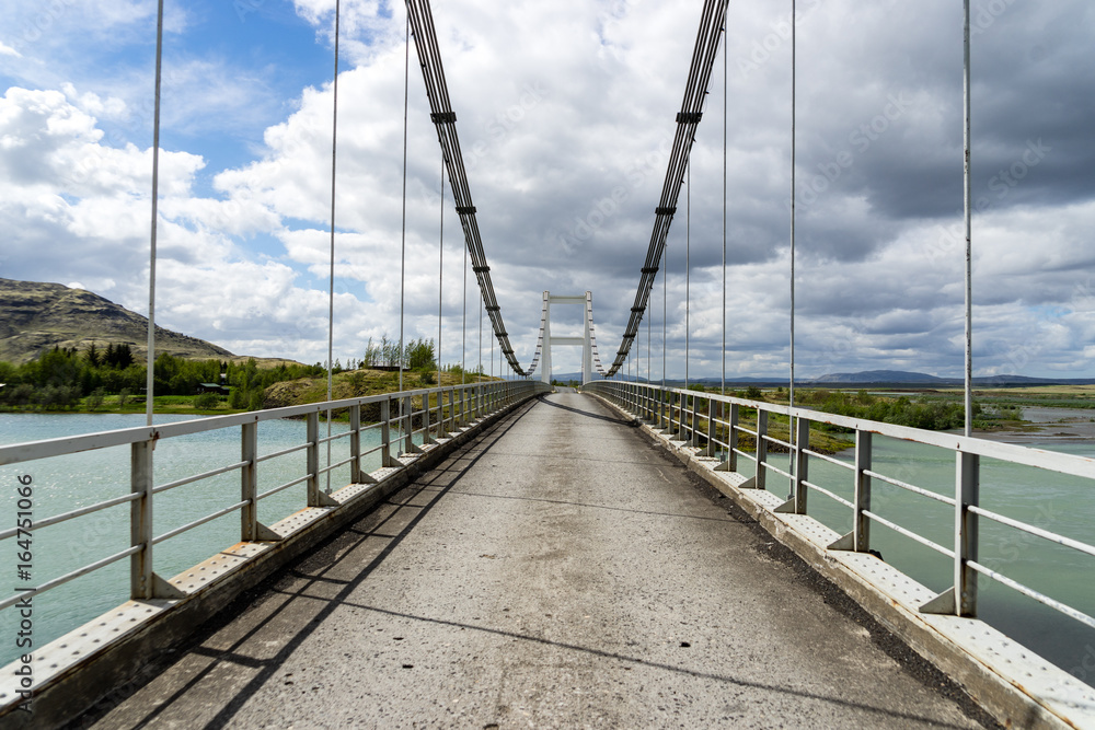 Suspension bridge in Laugaras, Iceland