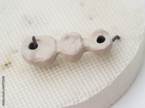 mplants teeth made in the technic Opaque porcelain dental. Oxidized metal opaque. photo