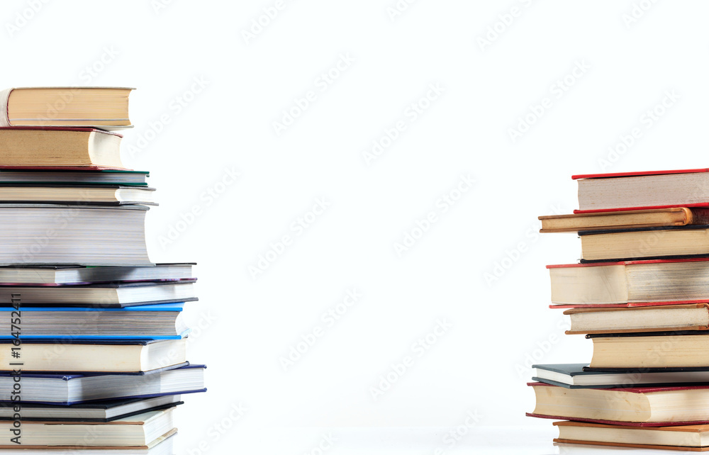 Fototapeta premium Books stacks on white background