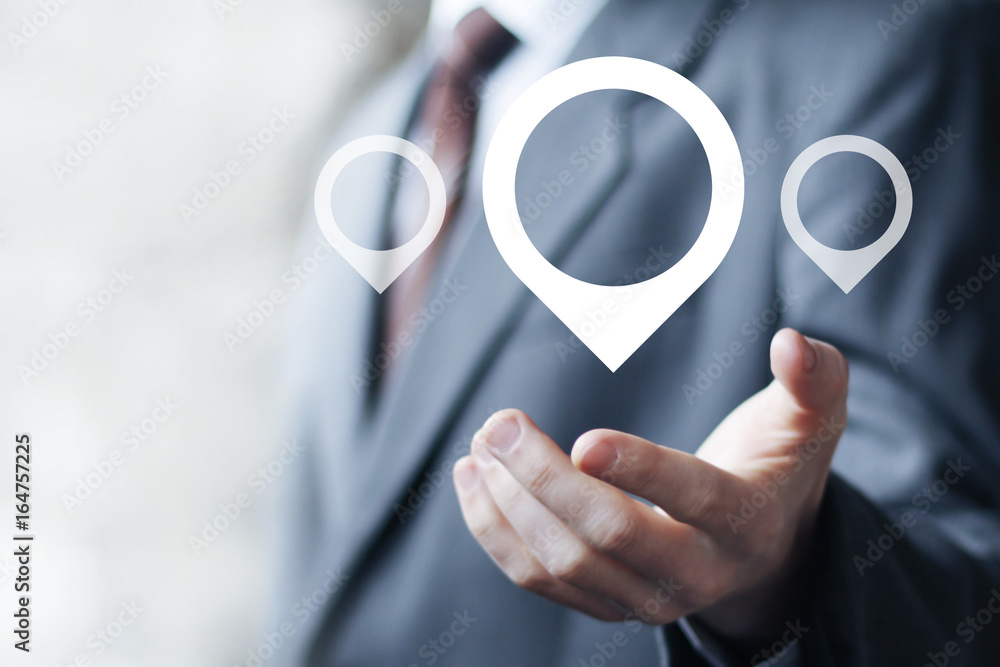 Businessman pressing button location Businessman pressing button location