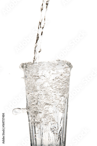 glass water with water beeing droped