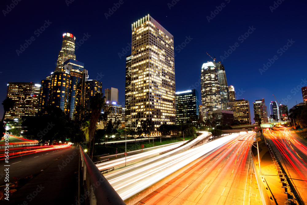 Fototapeta premium City of Los Angeles Downtown at Sunset With Light Trails