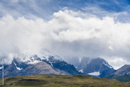 Mountain landscape with Torres rocks in the cloud. National Park Torres del Paine  Chile.