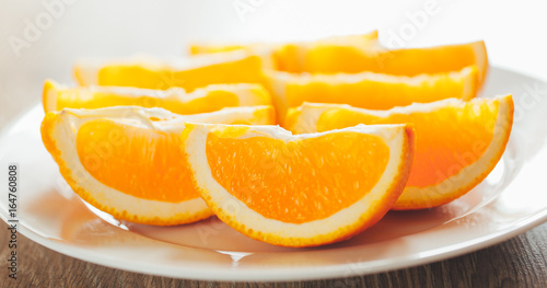 fresh orange slices on a plate