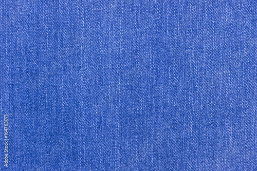 Dark blue jeans texture. Natural textile denim background