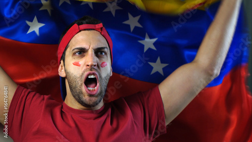 Venezuelan Guy Waving Venezuela Flag