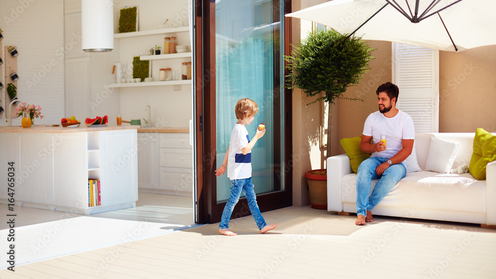 family lifestyle on summer patio, open space kitchen family lifestyle on summer patio, open space kitchen