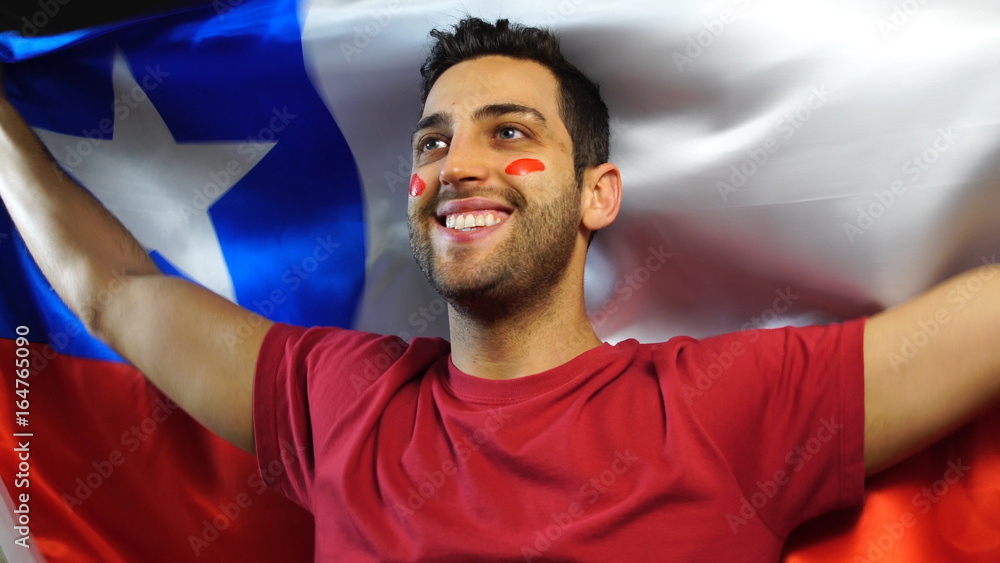 Fototapeta premium Chilean Guy Celebrating with Chile Flag