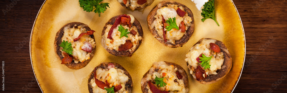 Stuffed Mushrooms with Bacon, Cheese and Breadcrumbs. Selective focus. Stuffed Mushrooms with Bacon, Cheese and Breadcrumbs. Selective focus.