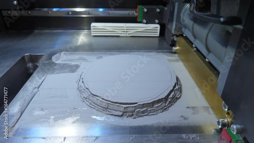 Working 3d printer. 3d printer mechanism working yelement design of the device during the processes. Working 3d printer close up of process. Modern 3D printer printing figure close-up macro photo