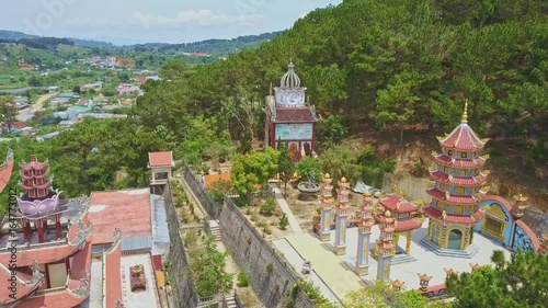 Aerial View Buddhist Temple Complex among Mountains photo