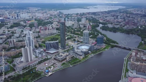 An aerial view of downtown Moscow looking over River Moscow. Top view of mid town in Moscow. Russian city skyline aerial view in the afternoon with the lights over blue hour