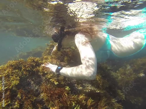 Swimming underwater photo