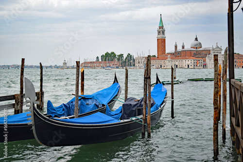 Gondolas near San Marco Piazza in Venice,Italy.. View towards San Giorgio Maggiore  © mhgstan