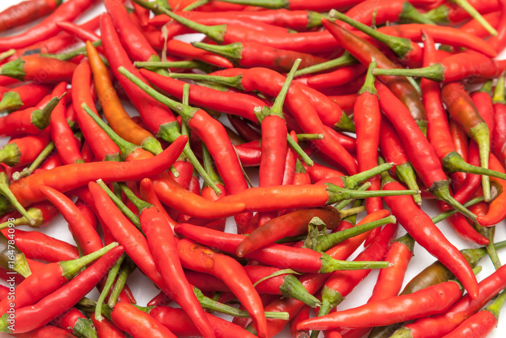 Many red chili, hot and spicy on the table for choosing and cooking