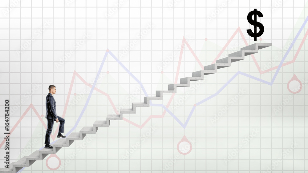 A businessman walking up on concrete stairway on red and blue graph background to a large black USD sign on the top. A businessman walking up on concrete stairway on red and blue graph background to a large black USD sign on the top.