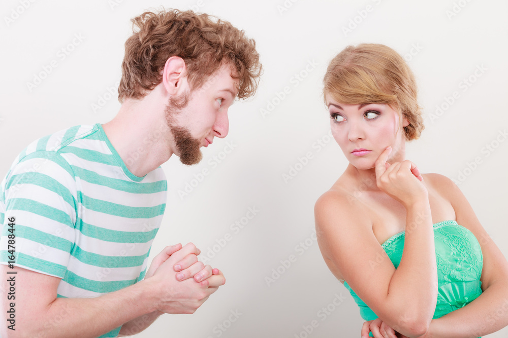 Man asking for forgivness. Conflicted couple. Man asking for forgivness. Conflicted couple.