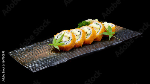 California sushi roll. Japanese tradition food with black isolated background