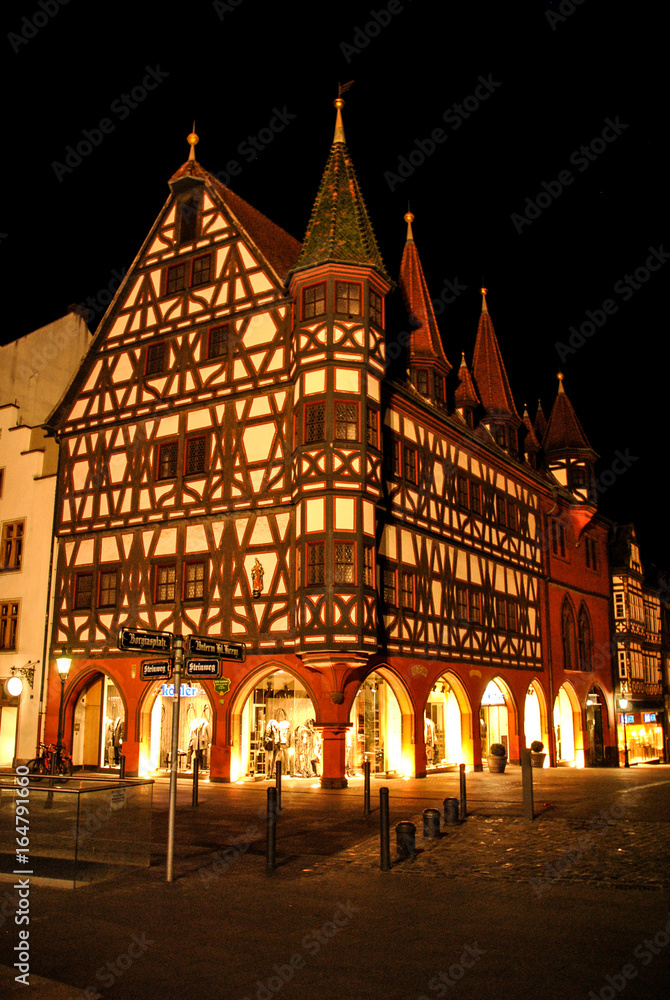 a frame house at night in germany