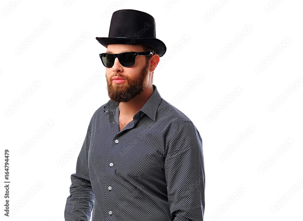 Bearded hipster male in sunglasses and cylinder hat. Bearded hipster male in sunglasses and cylinder hat.