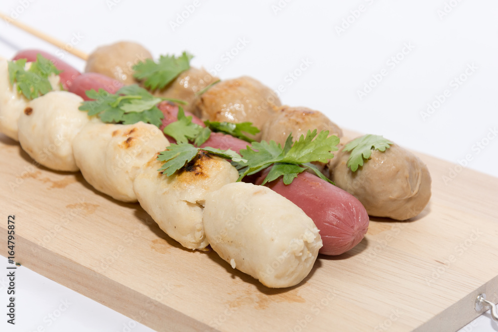 grilled meatball and red sausage with sauce grilled meatball and red sausage with sauce