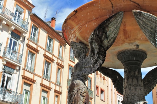 Trinity square fountain in Toulouse historic city centre, Haute Garonne, Occitanie region, France photo