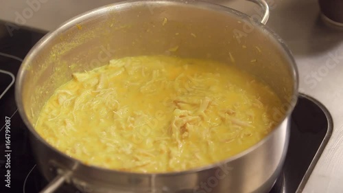 Stirring sauce with chicken