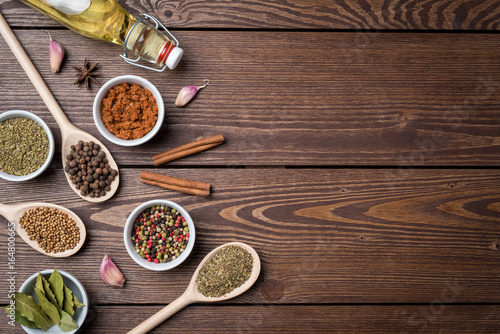 Fototapeta Naklejka Na Ścianę i Meble -  Fresh herbs and spices on wooden table. Close up