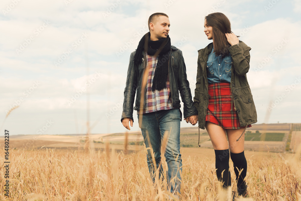 Young modern stylish couple outdoors