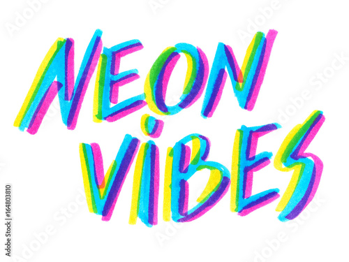 Big calligraphic hand written words "neon vibes" painted in neon blue, yellow and pink highlighter ink pen on clean white background