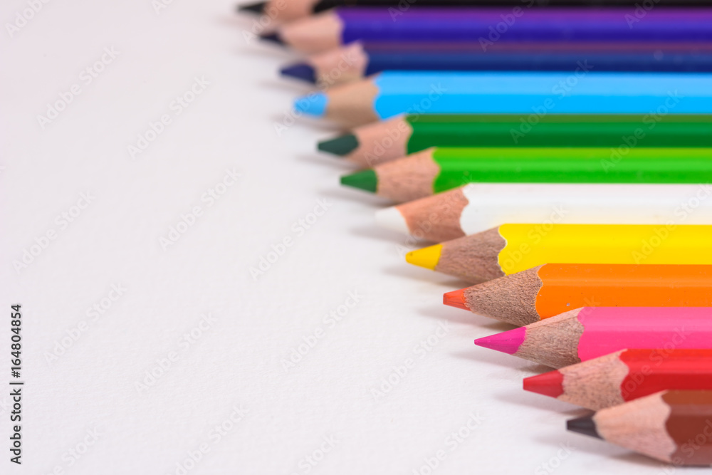 Color pencils isolated on wooden background.Close up. Color pencils isolated on wooden background.Close up.