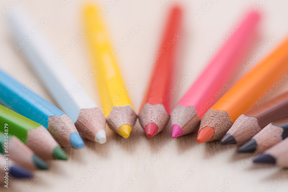 Color pencils isolated on wooden background.Close up. Color pencils isolated on wooden background.Close up.