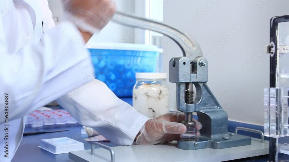 Person managing samples Person managing samples