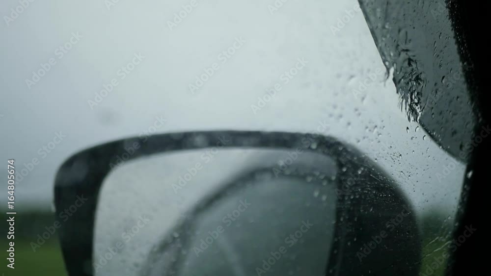 Swirling rain on the side of the car. SLOW MOTION. HD, 1920x1080. Swirling rain on the side of the car. SLOW MOTION. HD, 1920x1080.