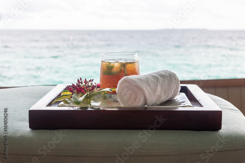 refreshing ice tea and towel at a spa