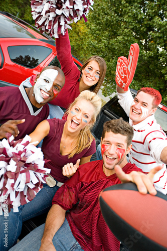 Tailgating: Group Of College Students Excited For Football Game