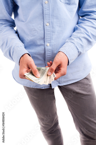 Man holding money bills isolated