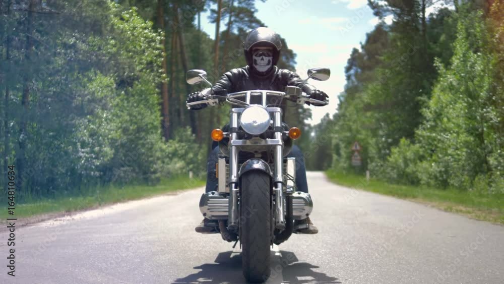 Motorcycle ride on empty road in forest. Motorcycle ride on empty road in forest.