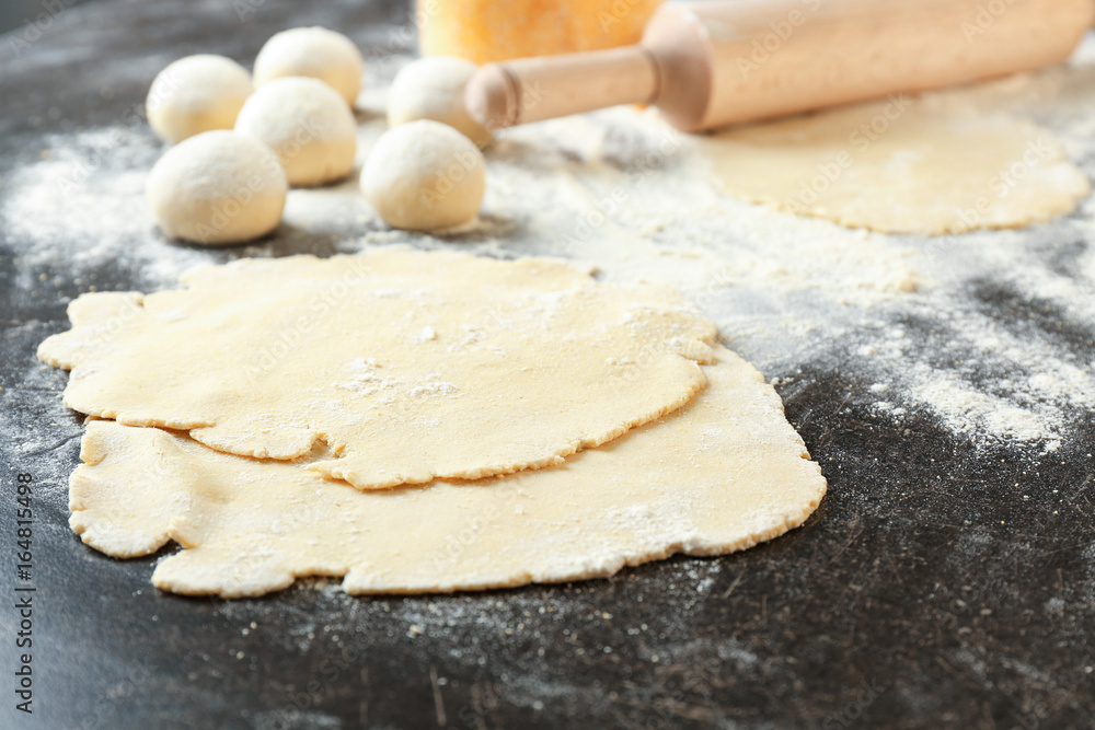 Unleavened dough for tortillas on kitchen table Unleavened dough for tortillas on kitchen table