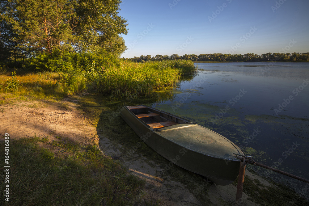 Fototapeta premium Boat on the riverside