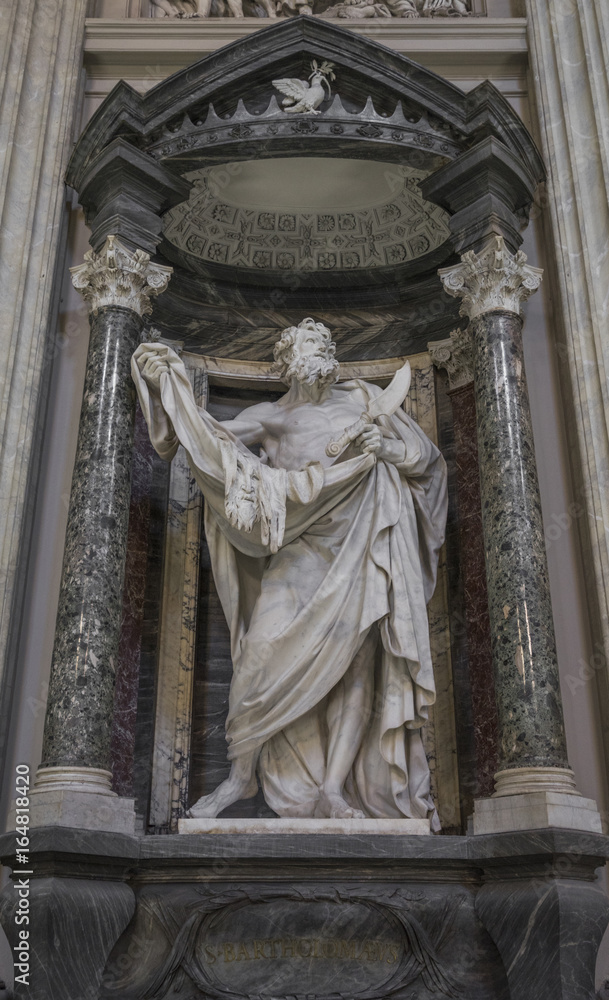 Statue of Saint Bartholomew, the martyred apostle holding his fl